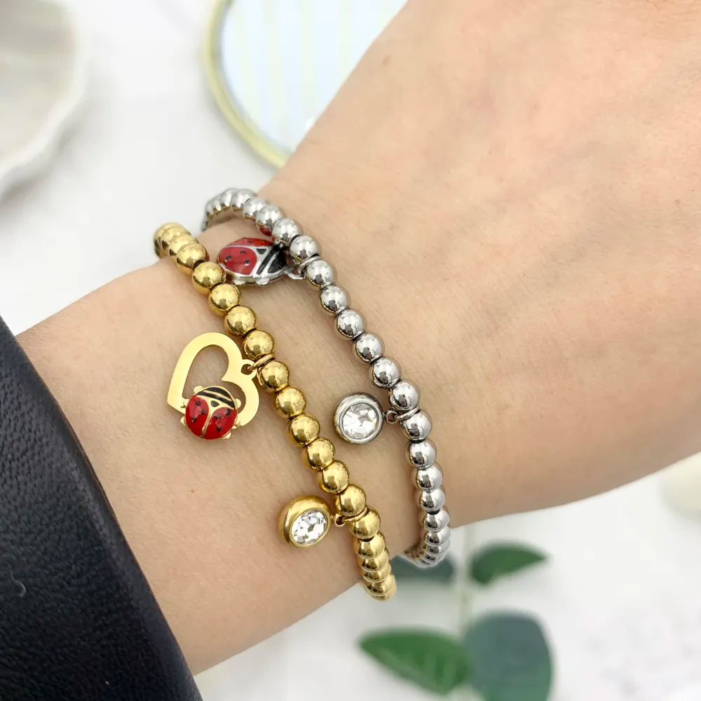 BPA-103-AA3670-3678B Mix Soggetti con Coccinella-15pz Bracciali Elastici in Acciaio